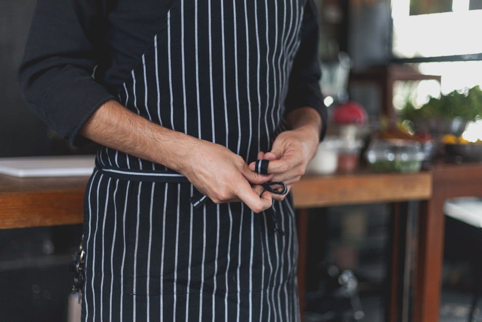 Professional restaurant kitchen with careful food preparation